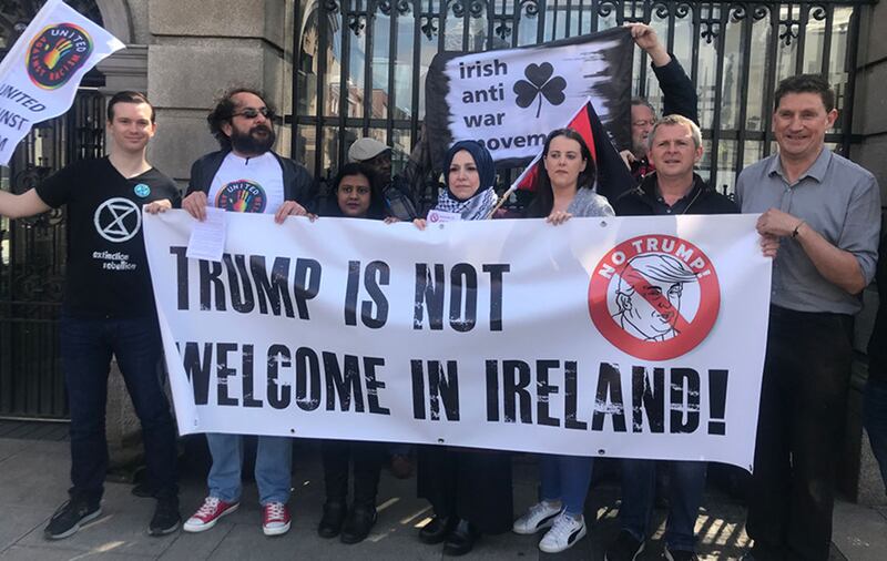 Protesters opposed to US President Donald Trump's visit to the Republic launch what is expected to be a series of demonstrations across Ireland with a photocall in Dublin&nbsp;