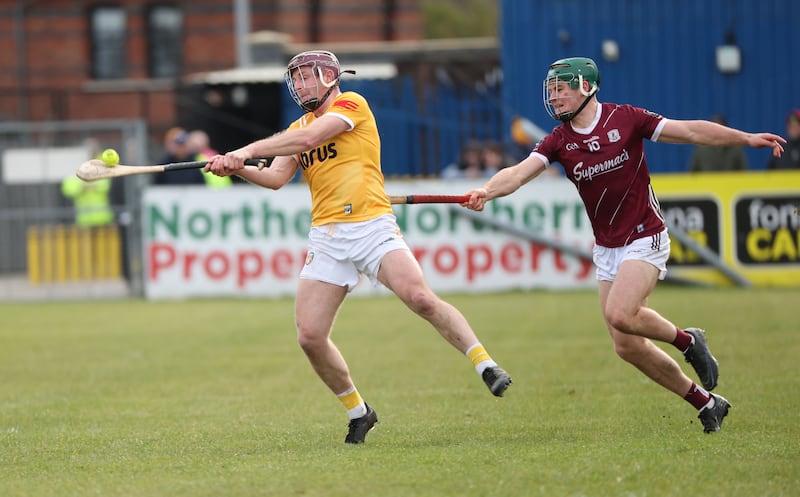 Antrim’s Eoghan Campbell   and Galway’s Gavin Lee in action during Sunday’s Allianz Hurling League Roinn 1 game at Corrigan Park in Belfast.
PICTURE: COLM LENAGHAN