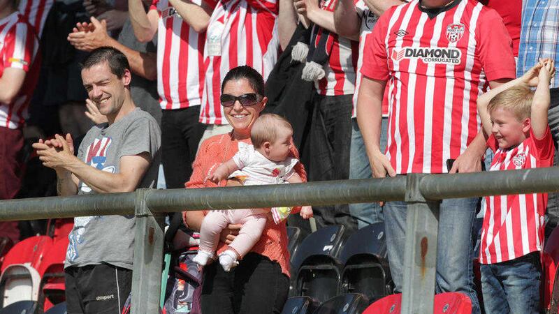 Baby Rioghnach-Ann McGrotty with mum Louise James at a Derry City match against Bray Wanderers at the Brandywell. Picture by Margaret McLaughlin 
