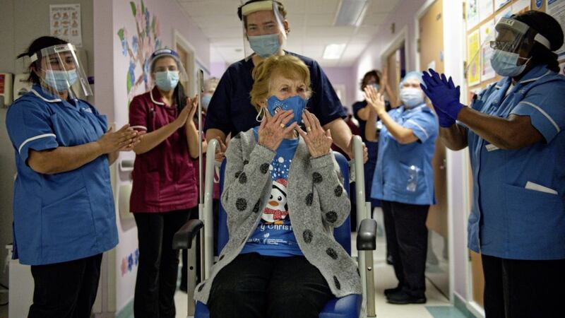 Margaret Keenan is applauded back onto her ward by nurses, after receiving the first Pfizer covid-19 vaccine. Picture by Jacob King/PA Wire 