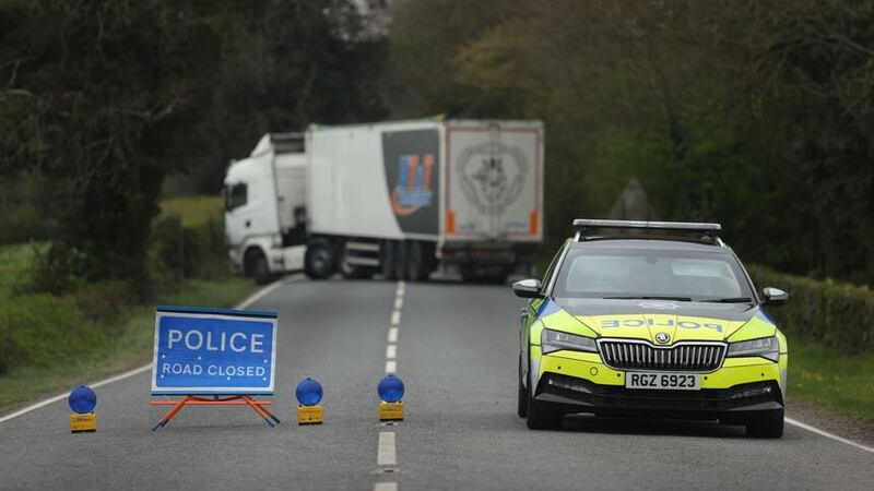 A police cordon on the A5 outside Aughnacloy, Co Tyrone, at the scene where three members of the same family in a collision. Picture by Liam McBurney/PA