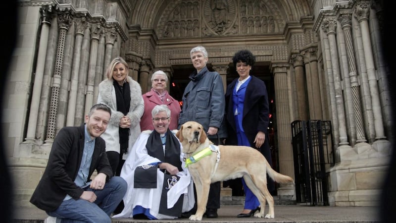 Dean of Belfast Stephen Forde pictured with special guest Lynda Bryans and charity representatives Pete Kernoghan, No More Traffic; Kathleen McGarrity, Colmcille Senior Citizens Club, Omagh; Carolyn Stewart, Youth Lyric; and Diane Marks, Guide Dogs NI with dog Morris 