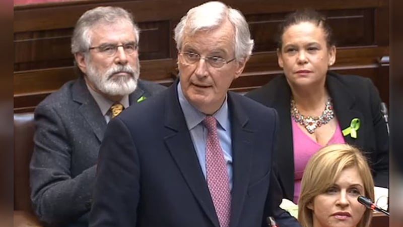 Screen grab of Sein Fein President Gerry Adams listening to Michel Barnier addressing the Oireachtas, where he said there is no reason why the European Union cannot have a &quot;strong relationship&quot; with the UK after it leaves the bloc but Brexit will inevitably have consequences. Picture by&nbsp;Houses of the Oireachtas/PA Wire&nbsp;