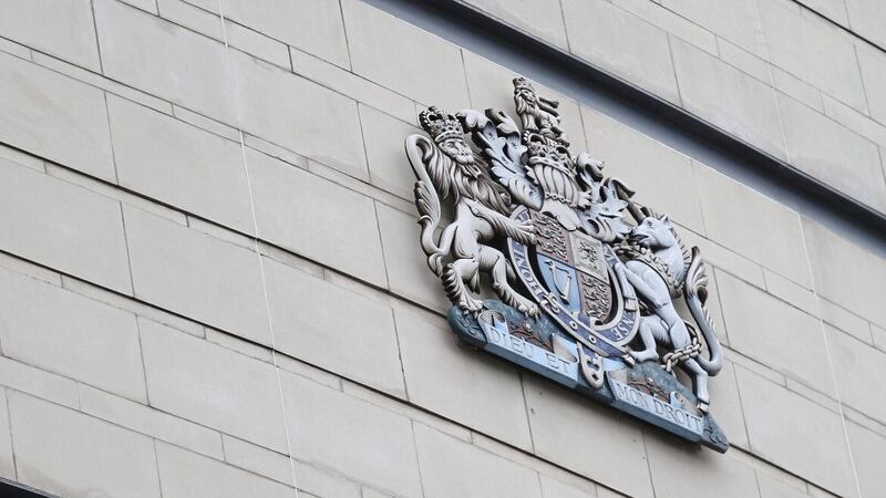 The woman was called to give evidence at a murder trial currently being held at Belfast Crown Court 