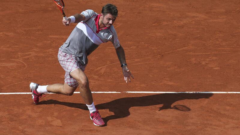 Switzerland&#39;s Stan Wawrinka on his way to victory over compatriot Roger Federer at the French Open on Tuesday Picture: AP 