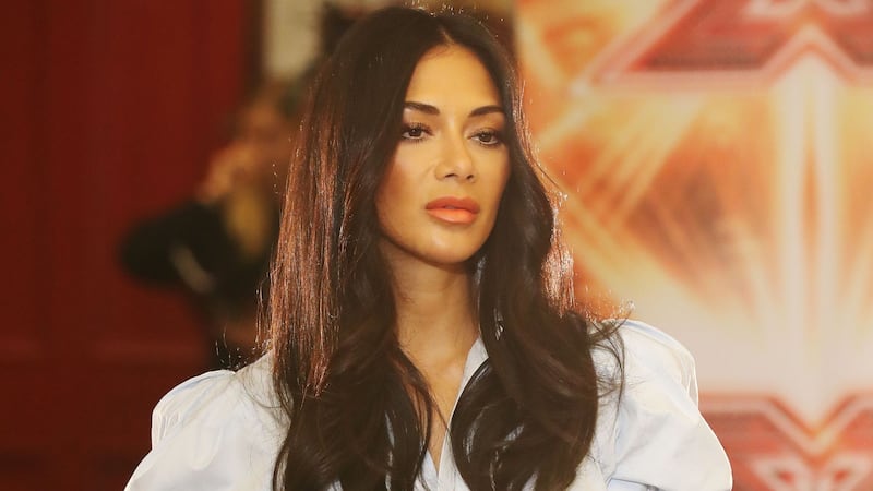 Simon Cowell and Louis Walsh threw shade at Nicole Scherzinger over her singing skills.