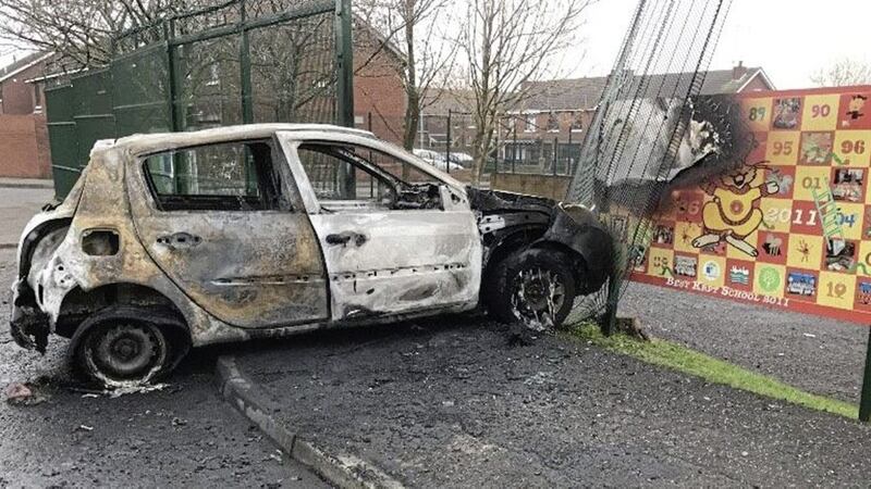 The car was found burnt-out having crashed into gates at St Peter&#39;s Nursery School in west Belfast in the early hours of Tuesday. Picture from PSNI/Facebook 
