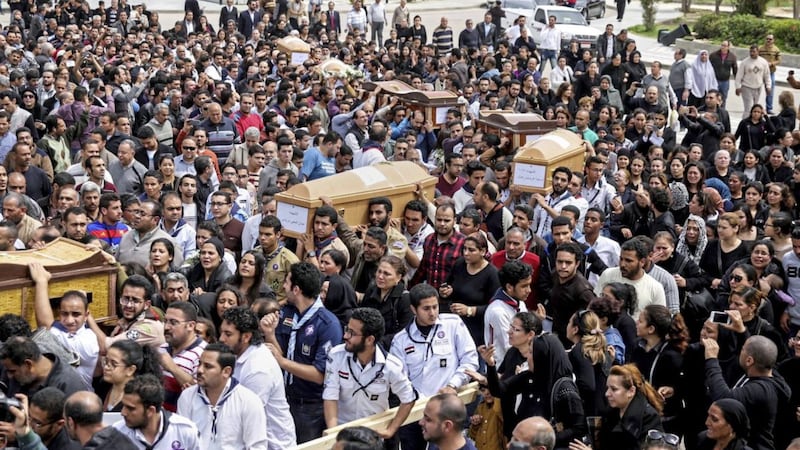 Coffins arrive for the funeral of those killed in a Palm Sunday church attack in Alexandria Egypt, at the Mar Amina Church on Monday. Picture by Samer Abdallah, Associated Press 