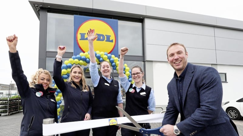 Ulster and Ireland rugby star Stephen Ferris joins the Lidl team to celebrate the official launch of its newest Northern Ireland store at Junction One in Antrim 