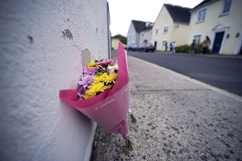 Flowers at the scene in Cosby Avenue, Fairgreen, Portlaoise, in Co Laois, where a three-year-old girl died after a crash. The collision involving a car and pedestrian happened in Cosby Avenue, Fairgreen, Portlaoise at about 1.15pm on Wednesday. Picture date: Wednesday August 30, 2023.