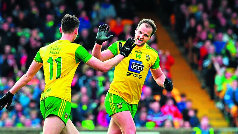 Michaels, Murphy and Langan celebrate Donegal's victory Picture by Margaret McLaughlin