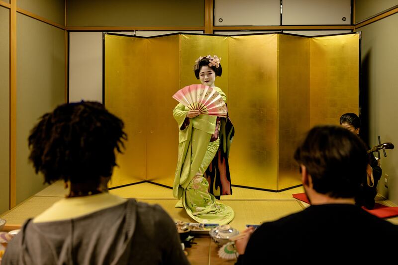 Enjoy a show from trainee geishas in a private dining setting (DMO Kyoto/PA)