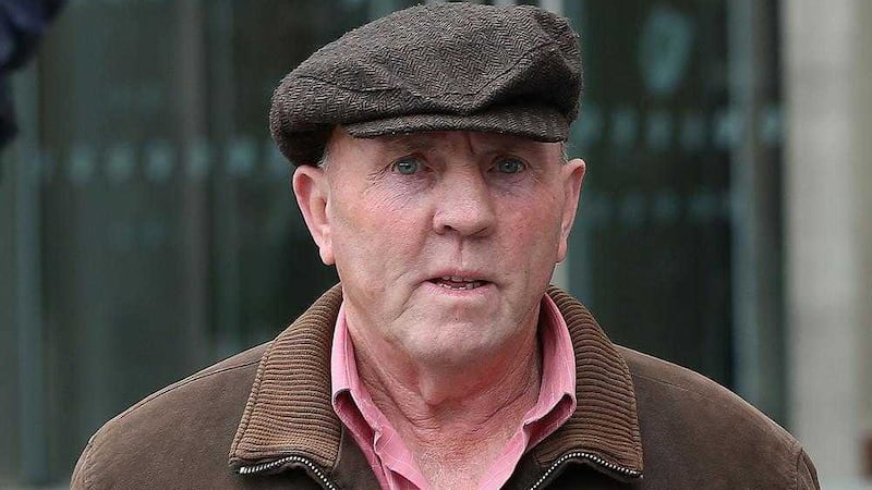 Thomas &quot;Slab&quot; Murphy, who owns a farm in Co Louth straddling the border with Northern Ireland, leaves the non-jury Special Criminal Court in Dublin, where he pleaded not guilty to nine tax offences in the Irish Republic.  Picture by Niall Carson/PA Wire 