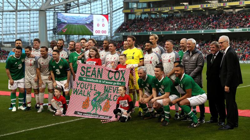 Both teams pose for a joint photo prior to the Sean Cox Fundraising match at The Aviva Stadium, Dublin. Picture by&nbsp;Brian Lawless, Press Association