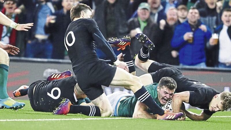 Ireland&#39;s Jacob Stockdale scores a try during the Autumn International match against New Zealand at the Aviva Stadium, Dublin. on Saturday November 17 2018. Picture by Niall Carson/PA Wire 