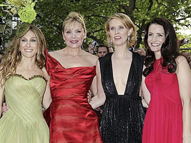 Kim Cattrall, pictured second left, and her Sex and the City character Samantha Jones have been cancelled for the reboot 