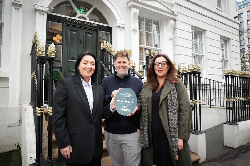 Justin Quirk (centre) with Wilton House property manager Melissa Crossley and Tourism NI’s Claire McNaughton, after the self-catering apartments were awarded a five-star accommodation grade.
