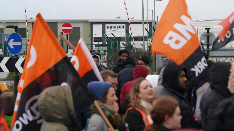 Amazon staff on a GMB union picket line outside the online retailer’s site in Coventry (Jacob King/PA)