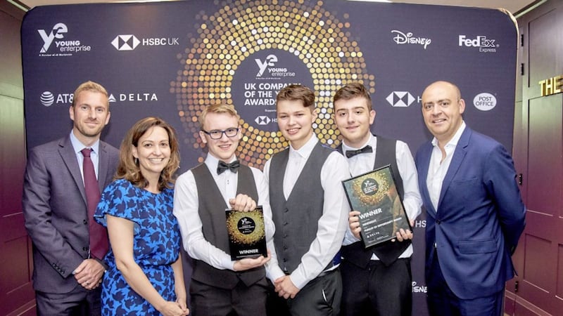 Young entrepreneurs from Belfast Boys&rsquo; Model and Mercy College pick up the Delta Air Lines Pursuit of Opportunity Award at the Young Enterprise UK final in London 