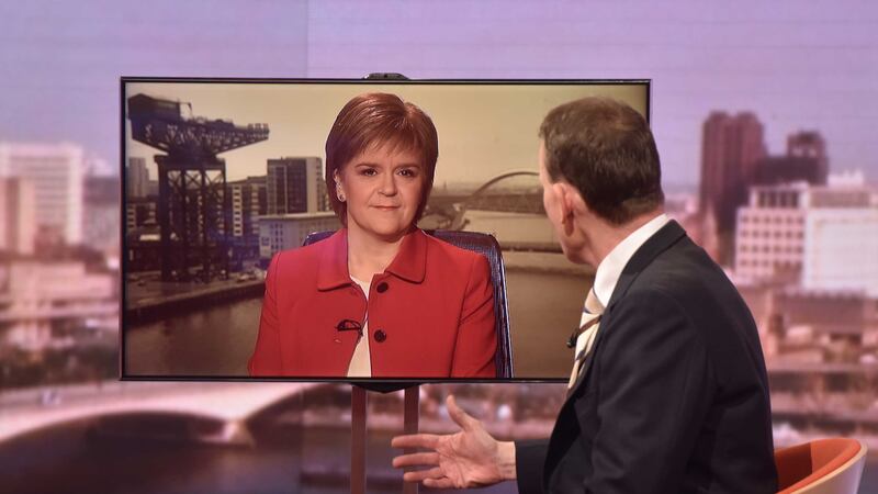 First Minister of Scotland Nicola Sturgeon, left, appearing via video link, speaking to Andrew Marr while appearing on BBC1's The Andrew Marr Show Picture by Jeff Overs/BBC/PA Wire