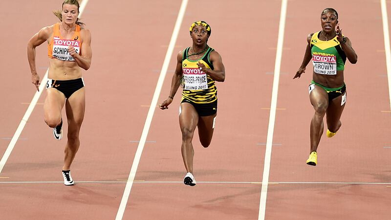 Jamaica's Shelly-Ann Fraser Pryce (centre) on her way to winning the Women's 100m final during day three of the IAAF World Championships at the Beijing National Stadium<br />Picture: PA