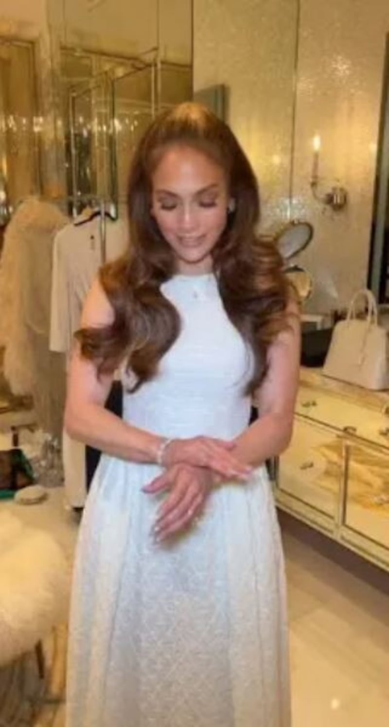 Jennier Lopez in the first of two wedding dresses. Picture from On The J.Lo