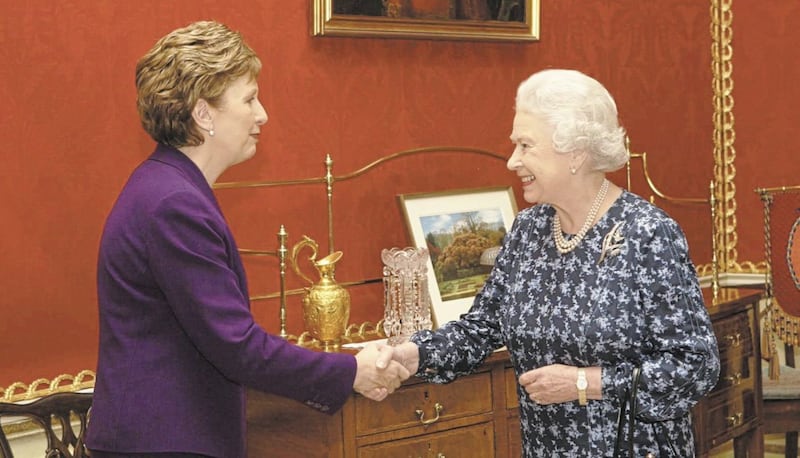 Britain&#39;s Queen Elizabeth II (right) greets Irish President Mary McAleese at Hillsborough Castle, Belfast, Thursday December 8, 2005. It is the Queen&#39;s first visit to Northern Ireland since February 2003. See PA story ROYAL Ulster. PRESS ASSOCIATION Photo. Photo credit should read: Niall Carson/Pool/PA. 