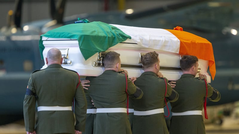 The body of Irish UN peacekeeping soldier Sean Rooney arriving at Casement Aerodrome, Baldonnel, on the outskirts of Dublin after being repatriated from Lebanon.  Picture by Tom Honan, Press Association