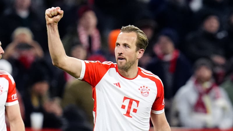 Bayern Munich’s Harry Kane celebrates at the end of their quarter-final win over Arsenal.