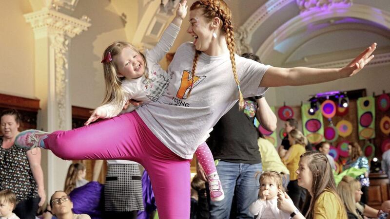 Baby Rave - Baby Evie Millar, from Carryduff, takes to the floor with Janie Doherty, dancer with Young at Art, during the Baby Rave at Belfast city hall. Photo by Cliff Donaldson 