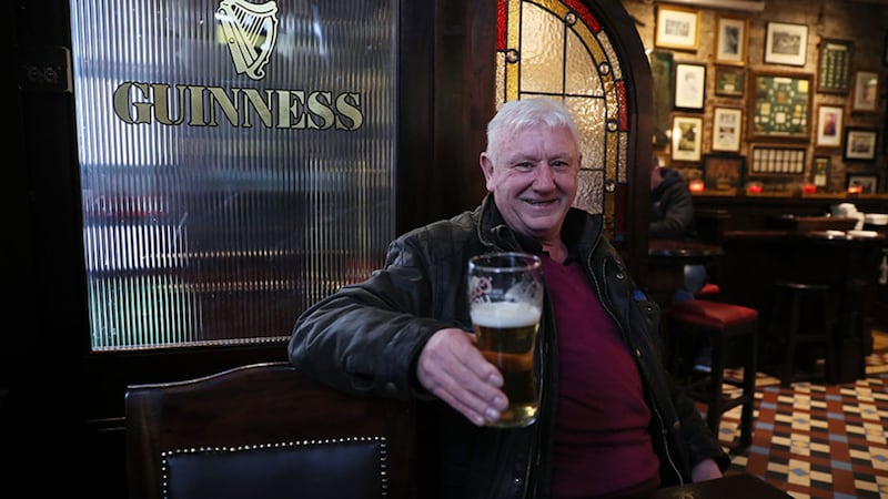 Jim Croke, a regular in Slattery's Bar on Capel street in Dublin, enjoys an early pint on Good Friday as legislation was passed earlier this year to allow pubs to serve alcohol&nbsp;
