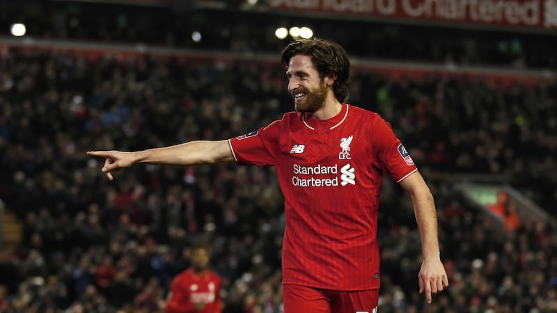 Liverpool's Joe Allen celebrates scoring his side's first goal of the game against Exeter