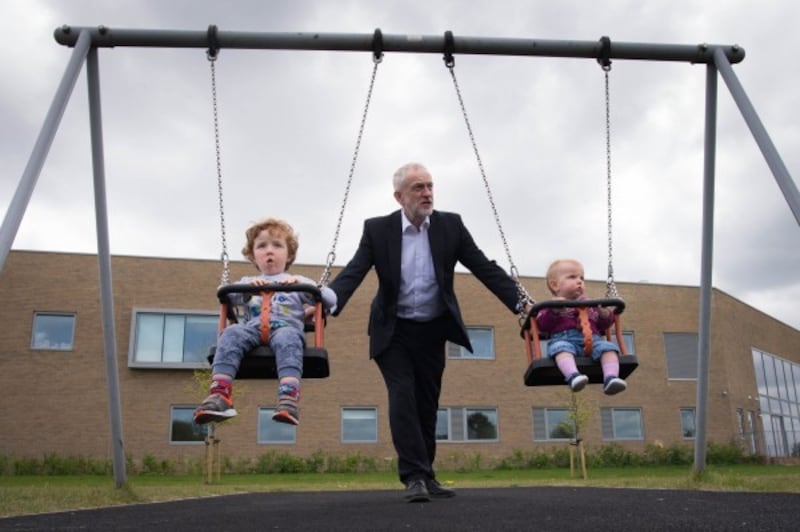 Labour leader Jeremy Corbyn with two children