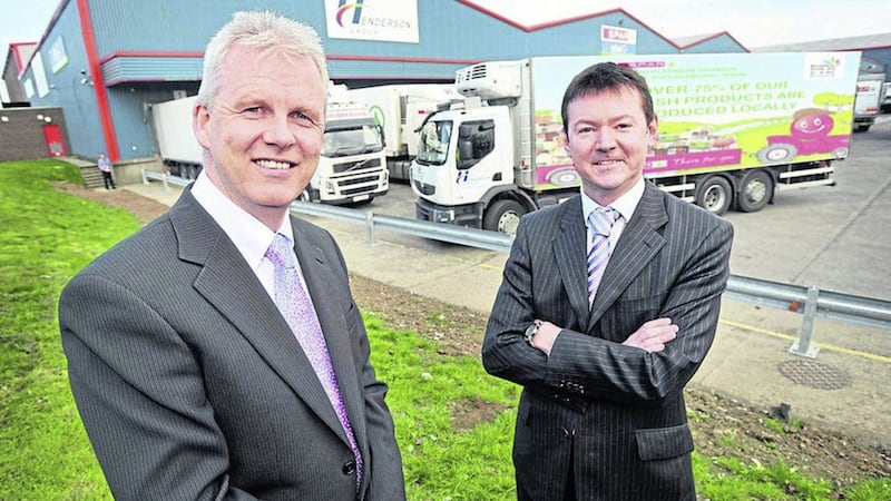 Henderson Group&#39;s sales and marketing director Paddy Doody (left) with group finance director Ron Whitten 