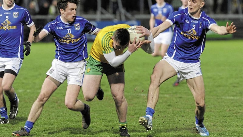Enda Flanagan and Killian Clarke of Cavan and Donegal&#39;s Patrick McBrearty in action during the 2014 Ulster U21 final. The players could renew acquaintances this weekend in what looks a game too close to call Picture by Declan Roughan 