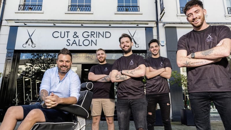 Pictured at the new Cut and Grind barbers in Lisburn Square are Kenny Parker and creative team members (from left)  Ethan McGowan, Sean McGharan, Jordan Bell and Micheal McAdams   