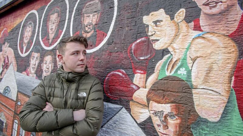 Irish News placement student Sean Whelan pictured at the boxing mural on Oldpark Avenue, north Belfast. Picture by Mal McCann 