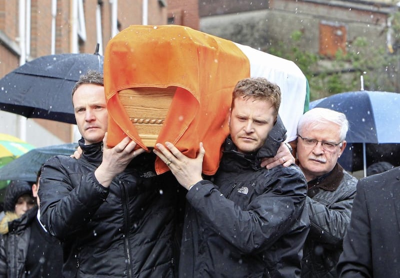 Martin&#39;s sons Emmett and Fiachra and brother William. The remains of Martin McGuinness are carried to his home through the Bogside in Derry on Tuesday. Picture Margaret McLaughlin 21-3-17. 