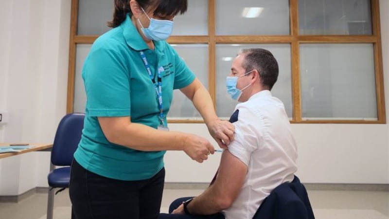 &nbsp; First Minister Paul Givan receiving his Covid-19 booster jab from vaccinator Moira Mulholland during a visit to Lisburn Primary and Community Care Centre in Lisburn, County Antrim, to encourage people to take up both doses of the vaccine and the booster dose when eligible.