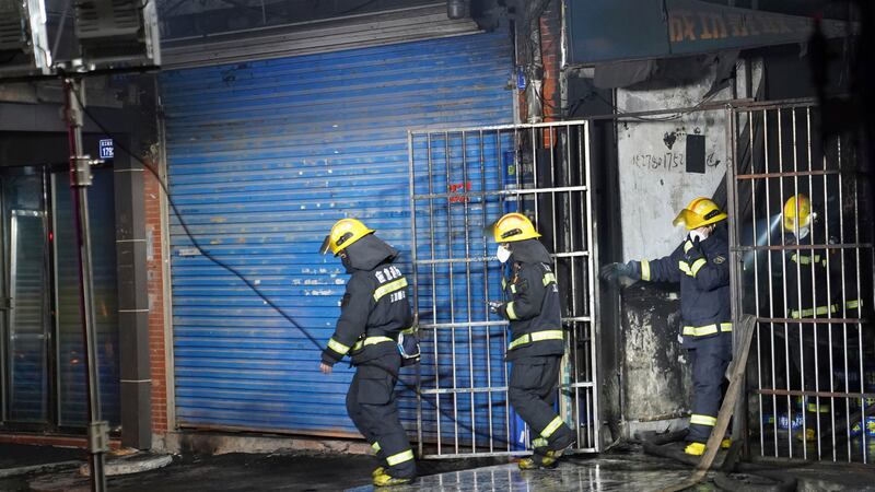 Firefighters tackled a fire in Jiangxi (Zhou Mi, Xinhua via AP)