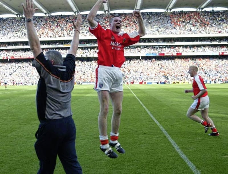 John Toal and Paul Grimley celebrate the final whistle of the 2002 All-Ireland final