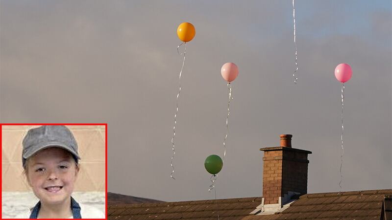 The song Shake it Off by Taylor Swift was played before balloons of different colours were released.