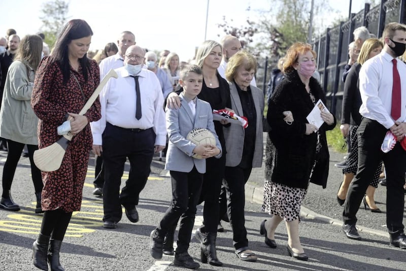 Anto Finnegan&#39;s family walking into Christ the Redeemer church in west Belfast. Picture by Hugh Russell 