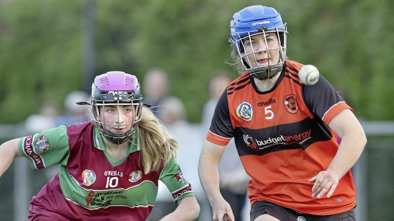 Eoghan Rua&#39;s Sophia Coyle with Sinead McGill of Lavey during the Derry Senior Camogie Championship quarter-final match at Ballinderry Picture: Margaret McLaughlin. 
