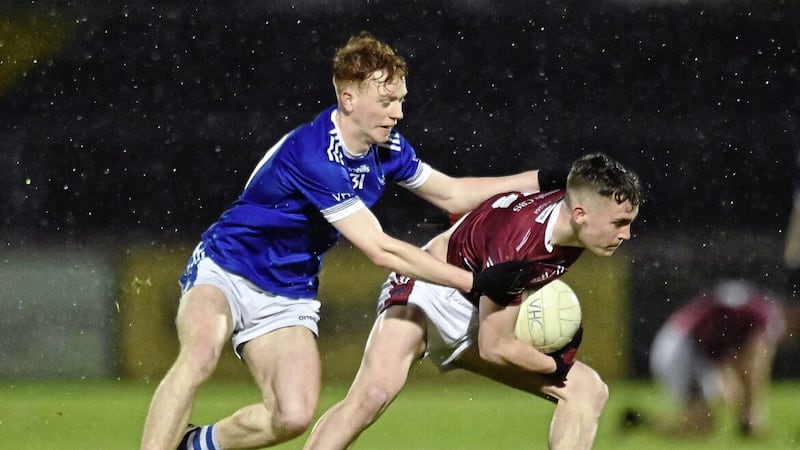 Eoin McElholm of Omagh CBS in action against Fionnbar McKee of St Colman&rsquo;s, Newry Friday&rsquo;s MacRory Cup quarter-final in Omagh     Picture: Oliver McVeigh