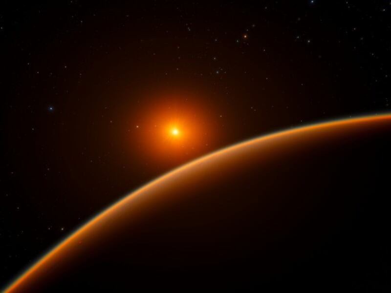 An artist’s impression showing the exoplanet which orbits a red dwarf star 39 light years from Earth.