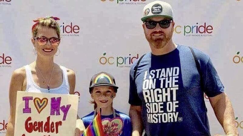 The photo of CJ, with his mum and dad at Pride event, that prompted James Woods&#39;s twitter comments 