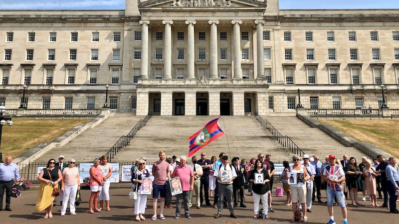 Members from the Innocent Victims United group and their supporters outside Parliament Buildings, Stormont, Belfast, as several victims groups held meetings with Northern Ireland Office officials at Stormont House. Picture by David Young/PA Wire&nbsp;