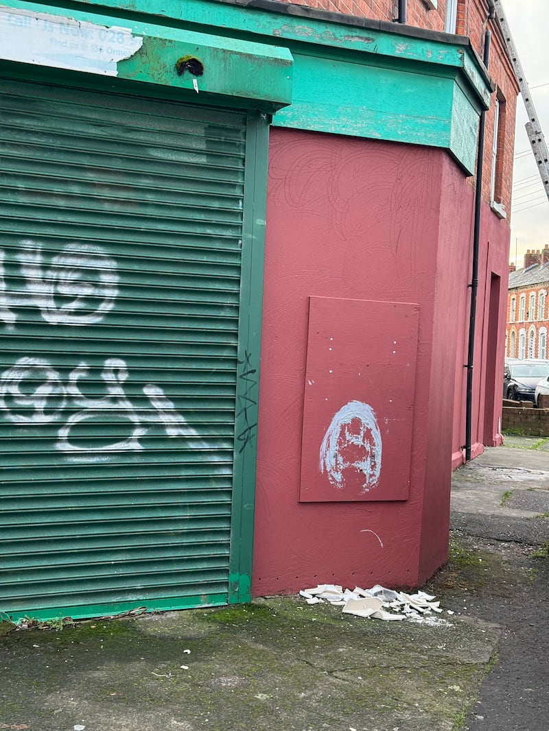 Spicebag and Bristol based art collective install a porcelain toilet with the DUP logo on the corner of Palestine Street and Rugby Avenue marking the DUP agreeing to return to the Stormont has now been smahed. PICTURE:  MAL MCCANN