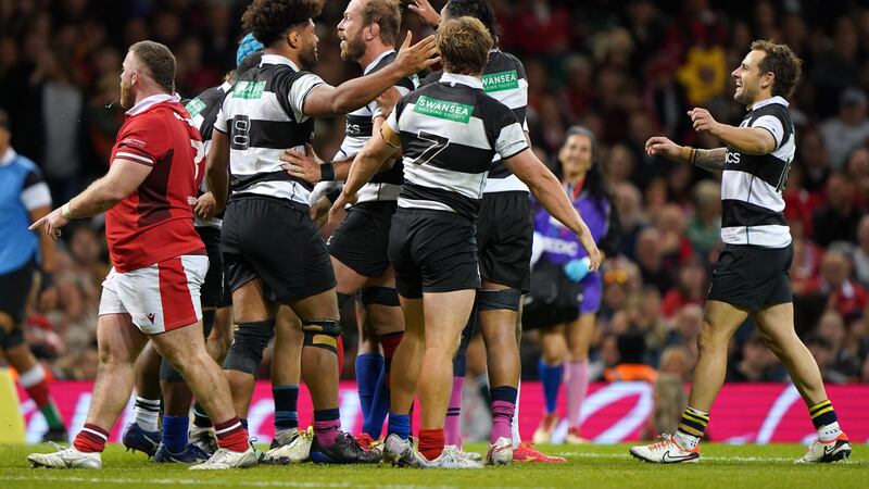 Barbarians captain Alun Wyn Jones (third from left) celebrates scoring a try during the 49-26 defeat against Wales (Joe Giddens/PA).